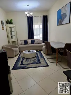 Furnished one-bedroom apartment for monthly rent in Ajman - Al Rashidiya - Orient Towers | Stylish a