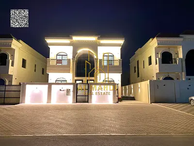 Direct from the owner, including all ownership fees: a villa in one of Ajman's most luxurious villas, built and finished to a super deluxe standard