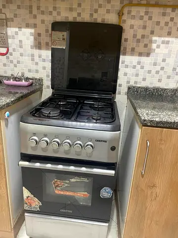 Geepas 4-Burner Gas Cooker with Oven - Good Working Condition