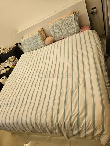 Queen size bed with headboard and storage - good condition