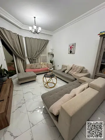 Luxury two-bedroom apartment with a living room and balcony. Ajman, Al Rawda. Fully furnished. For monthly rent.