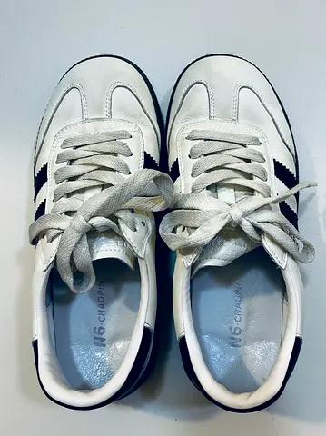 White leather casual sneakers with navy accents - gently used
