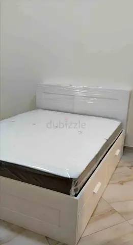 IKEA brimness double size bed with 4 storage drawers underneath+ headboard and