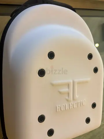 Hard shell cap carrier backpack