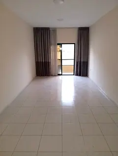 Property Title: Amazing Rental Deal! Modern 1-BR Apartment with Balcony for Annual Rent in Ajman - R