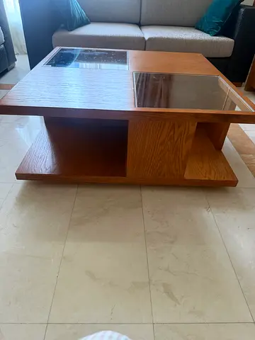 A large coffee table with storage