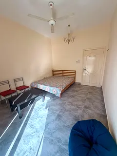 Bright  Spacious Room with big Balcony  Separate Washroom| Prime Karama Location- Fully Furnished