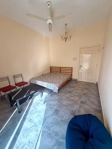 Bright  Spacious Room with big Balcony  Separate Washroom| Prime Karama Location- Fully Furnished