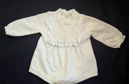 Cream knitted long-sleeve baby romper with lace bib - newborn/0-3M