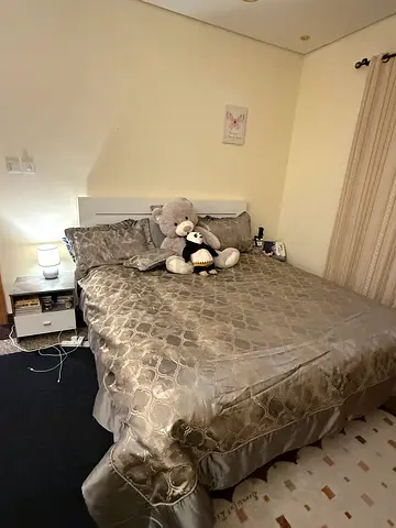 Queen bed with matching bedding set - gently used
