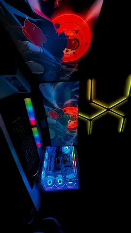 Custom RGB Gaming PC Setup with Themed Desk Mat and LED Tower