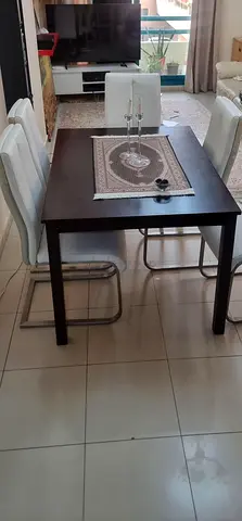 Dark Wood Dining Table with 6 White leather Chairs - Good Condition