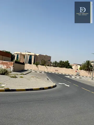 For Sale in Sharjah, Al Tarfa Area Residential Land Corner on three streets, 18 meters wide and 12 meters wide, Area: 7131 sq ft
