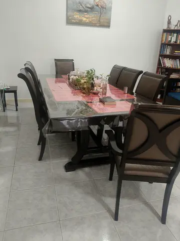 Solid Wood 8-Seater Dining Table with Upholstered Chairs - Good Condition