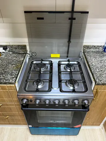 Used 4-Burner Gas Stove with Oven - Stainless Steel