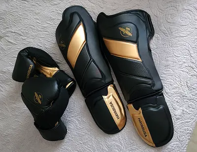 Hayabusa boxing gloves and shin guards set - black/gold, leather