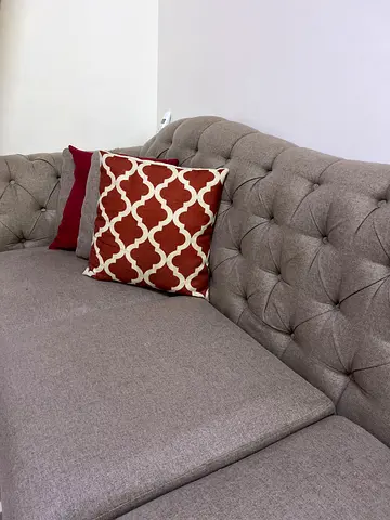 Grey tufted 3-seater sofa with cushions - good condition