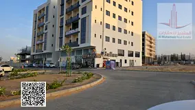 For sale in Ajman: Residential/commercial land in Al-Aliya, G+5, area 8000 sq ft, on a main road. As