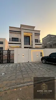Distinctive villa in Al Helio Center with high‑end finishing, two stone façades, G+2 with rooftop