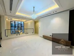 5 bedrooms, large living room, luxurious men's majlis, fully equipped kitchen, bathrooms, high-e