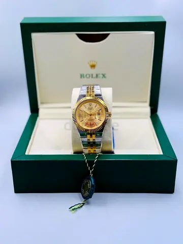 Rolex two-tone ladies watch in box — good condition
