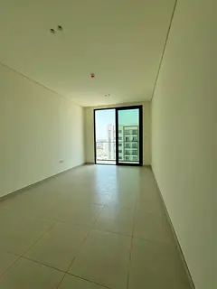 Two-bedroom apartment with a living room available for annual rent in Sharjah, Al Zahia, in a new bu