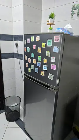 Medium-sized black refrigerator - good working condition
