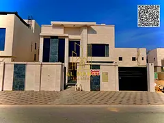 For sale, a luxury villa in a prime location in Al Alia Area Ajman, directly facing a main paved roa