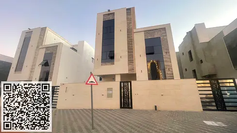 Large villa for sale in Ajman, including registration and ownership fees, at a reasonable price.