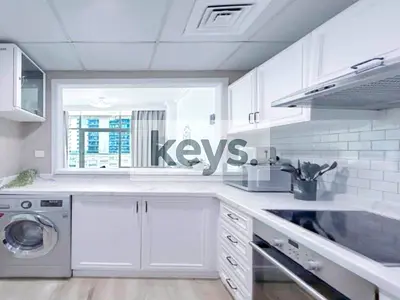 Elegant 1BR | Partial Sea View | Ready to Move In