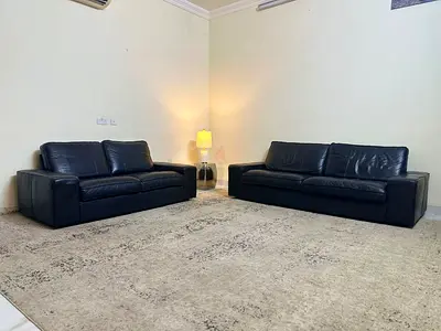 Set of 2 Black Leather Sofas - Good Condition