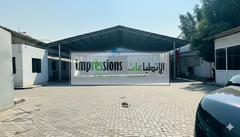 Warehouse with Open Yard for Rent in Industrial Area No.4, Sharjah | Prime Main Road Location