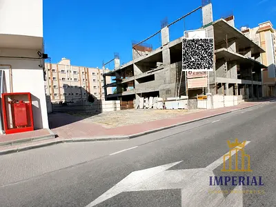 Residential and commercial plot (G+4) for sale in a prime location in Al Rashidiyah 1, Ajman – freehold