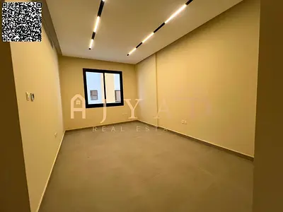 Annual 2BR apartment in Al Jurf 3, Ajman. New first-tenant building, balcony, central AC, wardrobes