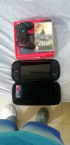 Portable handheld gaming console with controller and Zelda game
