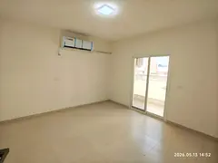 Upscale two-bedroom apartment with a living room in Al Majaz 2, Sharjah, available for annual rent