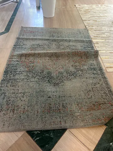 Modern distressed area rug - muted grey and rust tones, good condition