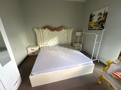 Queen bed matress side table with dressing table tourist club Abu dhabi UAE