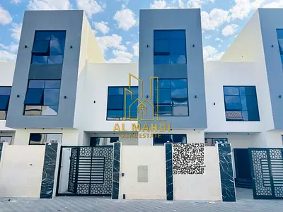 A villa for sale in Al Yasmeen, Ajman, with all registration and ownership fees included. Located on the main street, this villa is ready