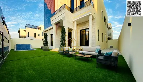Two-story villa with a swimming pool and rooftop terrace, 5 bedrooms, at a special price including registration fees, in one of Ajman's most prestigio