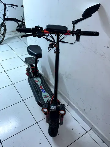 Electric Scooter with Seat — Used, Good Working Condition battery good condition very comfortable