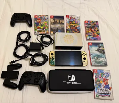 Nintendo Switch OLED model with accessories and 8 games (Pro Controller, charging dock, grip, case)