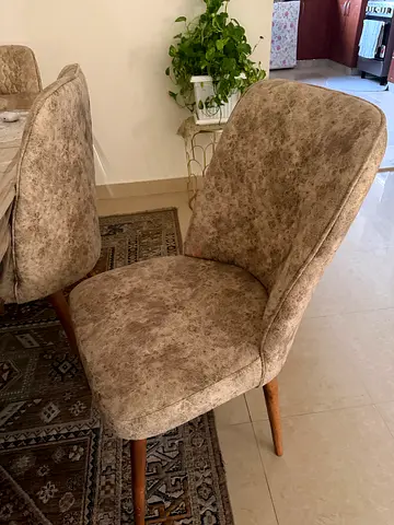 Pair of upholstered extended table dining chairs with wooden legs - beige textured fabric