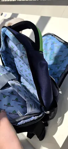 Blue lightweight backpack with branded lining — good condition