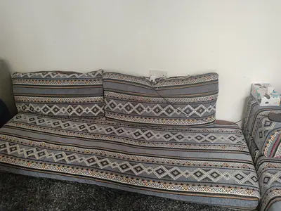 Three-seater patterned fabric sofa (good condition)