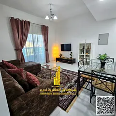 Furnished one-bedroom apartment for rent in Ajman, clean and tidy furnishings, on the Ajman Corniche