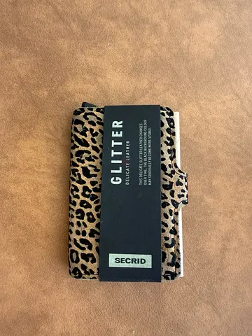Secrid Giltter Leopard Print Cardholder, used once but prefer a bigger one.