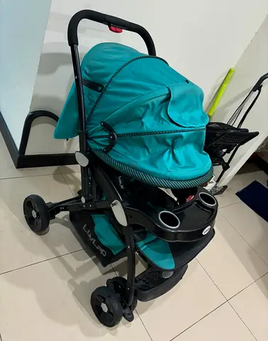 Used teal baby stroller - comfortable standard stroller in excellant condition