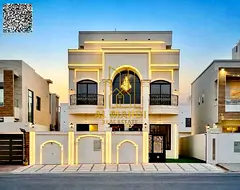 Villa for sale in Al Yasmin, Ajman | 6 master bedrooms + roof | Two streets (front and back) | Elect