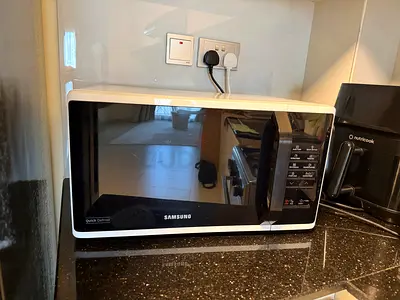 Samsung Microwave Ovens 23Liters 800W Solo with Quick Defrost MS23K3513AW